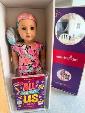 American Girl Doll with Pink and Teal Streaked Hair and Floral Dress